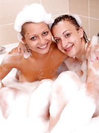 FreshPornPics presents: Naughty sexy young chicks taking a hot bubble bath together