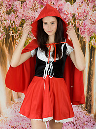 FreshPornPics presents: This hot shapely doll enjoys surrounding herself with flowers and shows her perfect wet pussy as well.