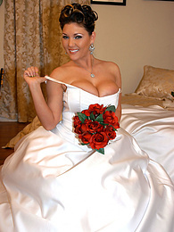 FreshPornPics presents: Horny bride Claire Dames enjoys licking her big tits and fingering her pussy