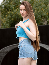 FreshPornPics presents: Beautiful Brunette Teen Hazel Shows Off Her Hairy Pussy and Masturbates Outdoors.