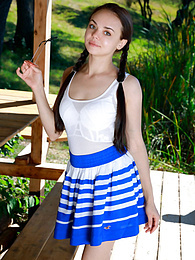 FreshPornPics presents: Fresh-Faced russian beauty Mia Grandy gets totally naked on a picnic table in a garden